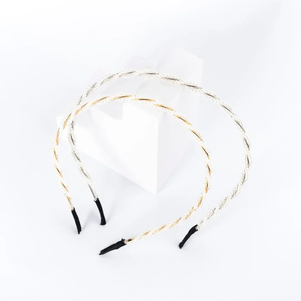 VINCHA CON PERLAS ENROSCADAS